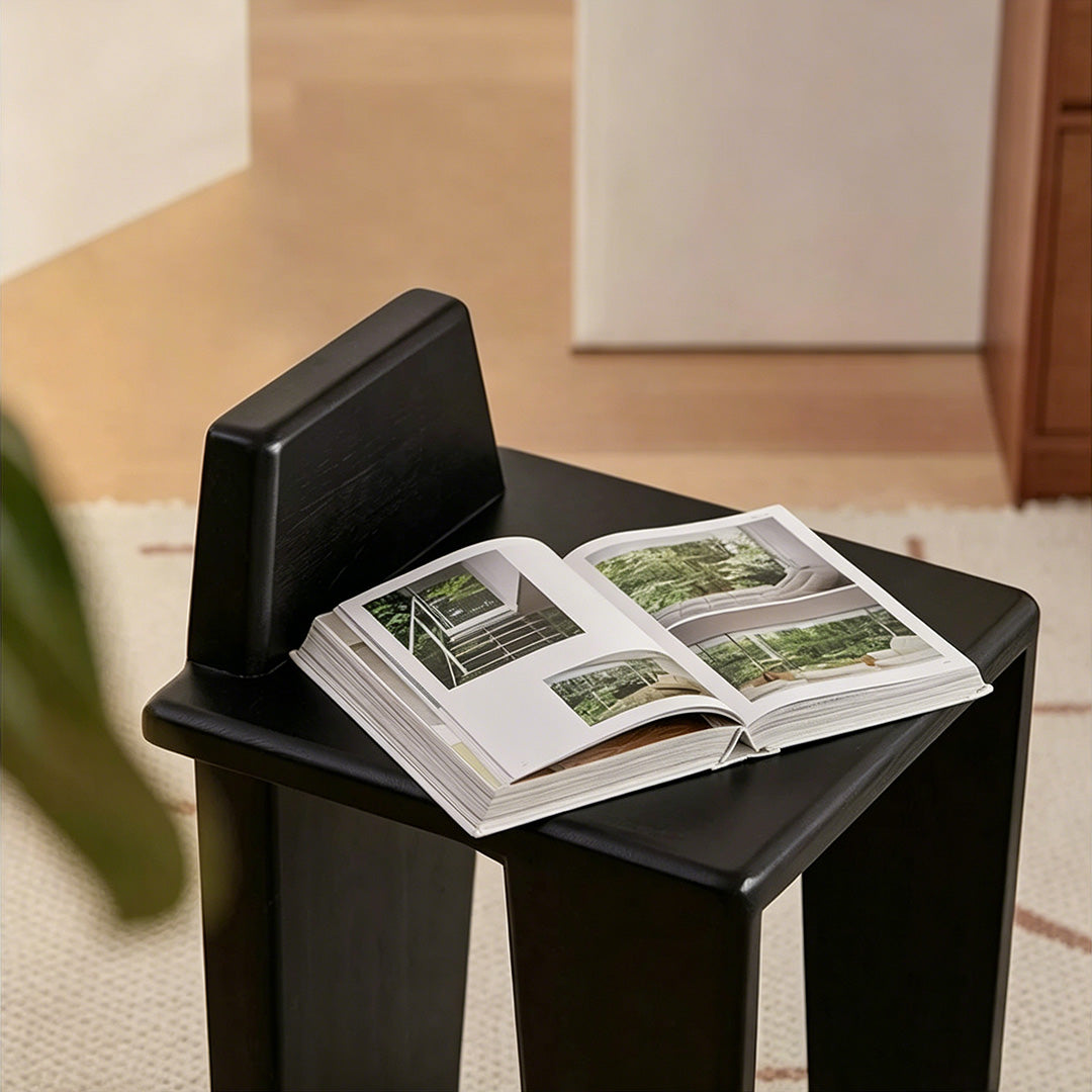 Black Briar dining chair with book on the seat