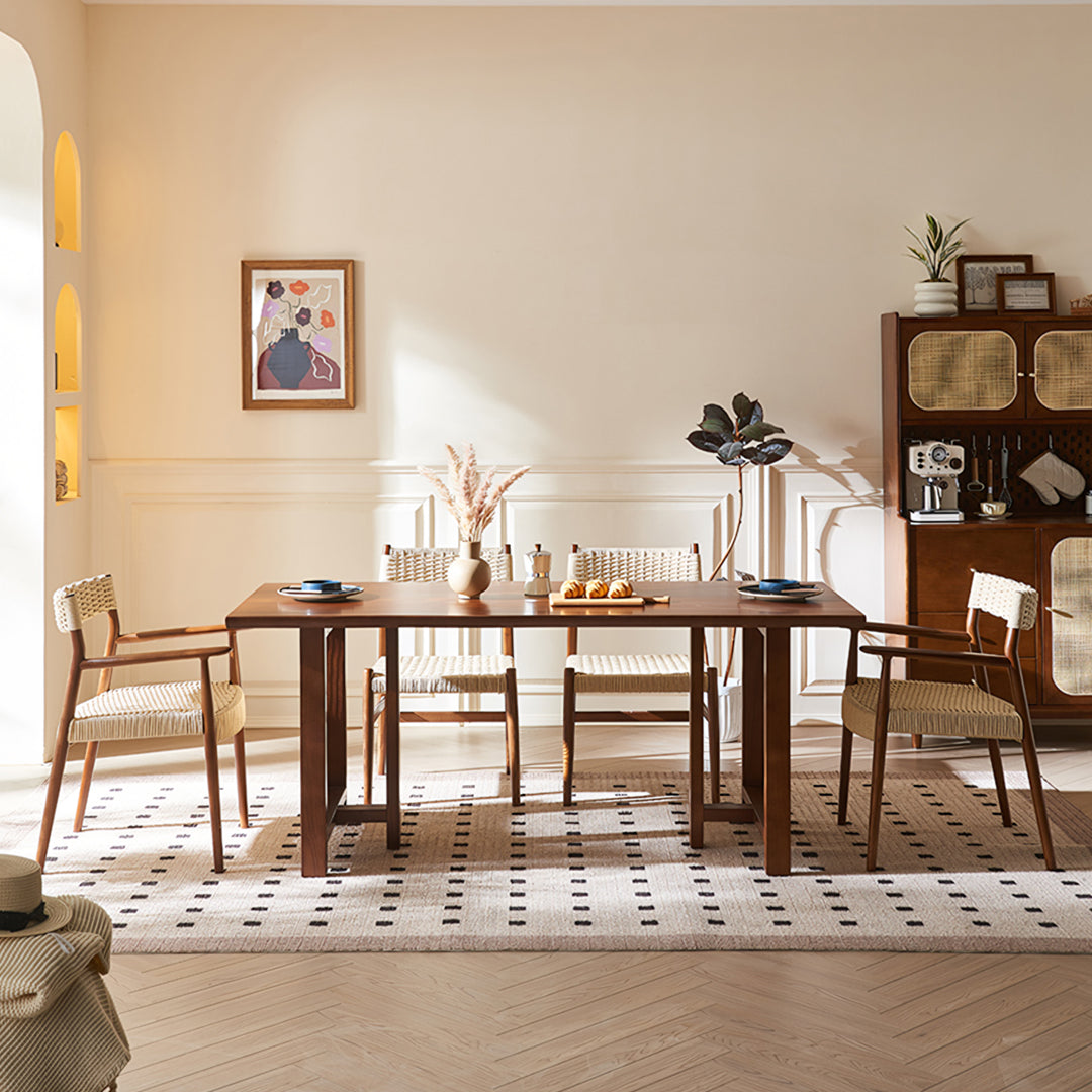 Fuchs Dining Table, Solid Wood & Rattan, Dark Oak in a lifestyle setting with small rectangle dining table