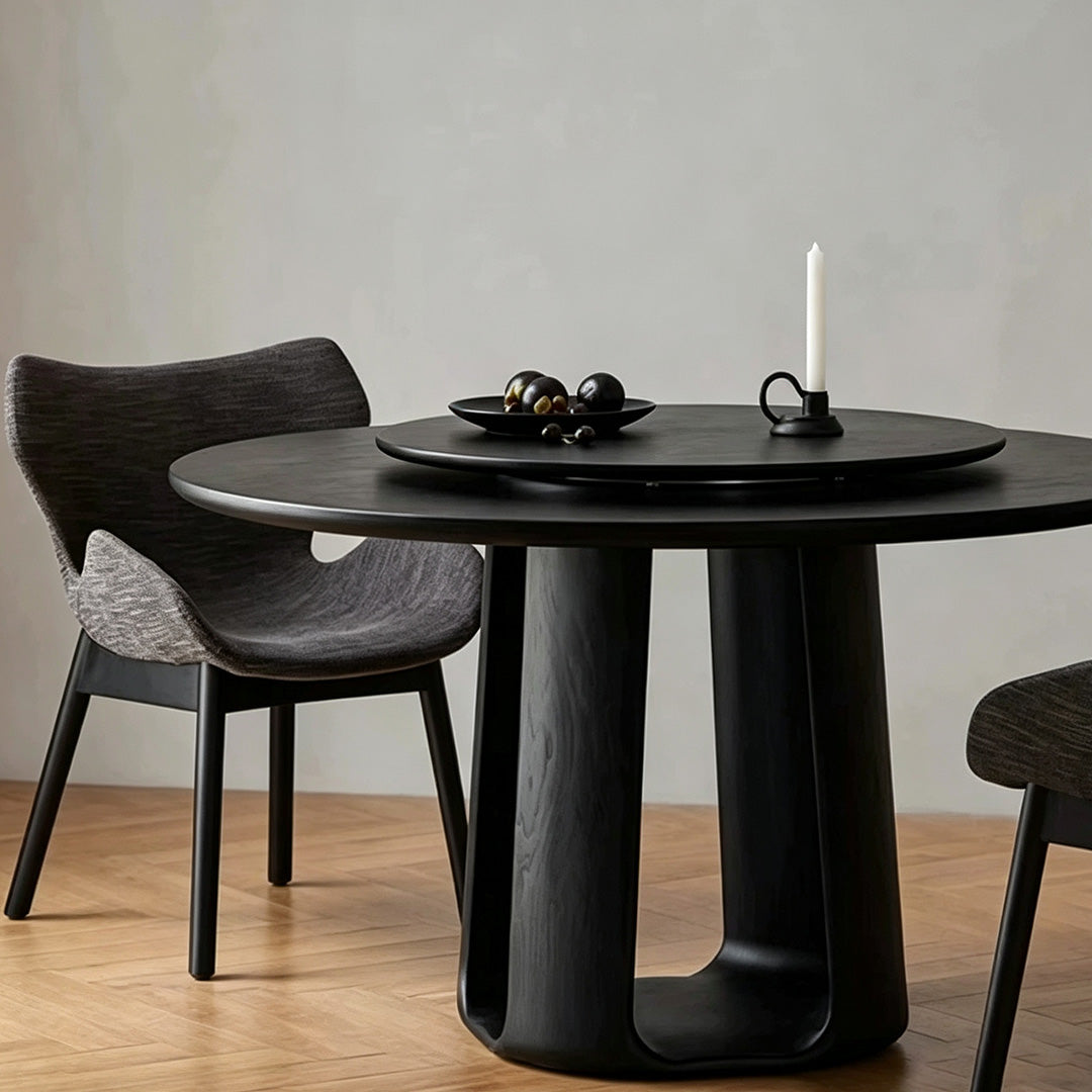 Landon black ash round dining table angled view