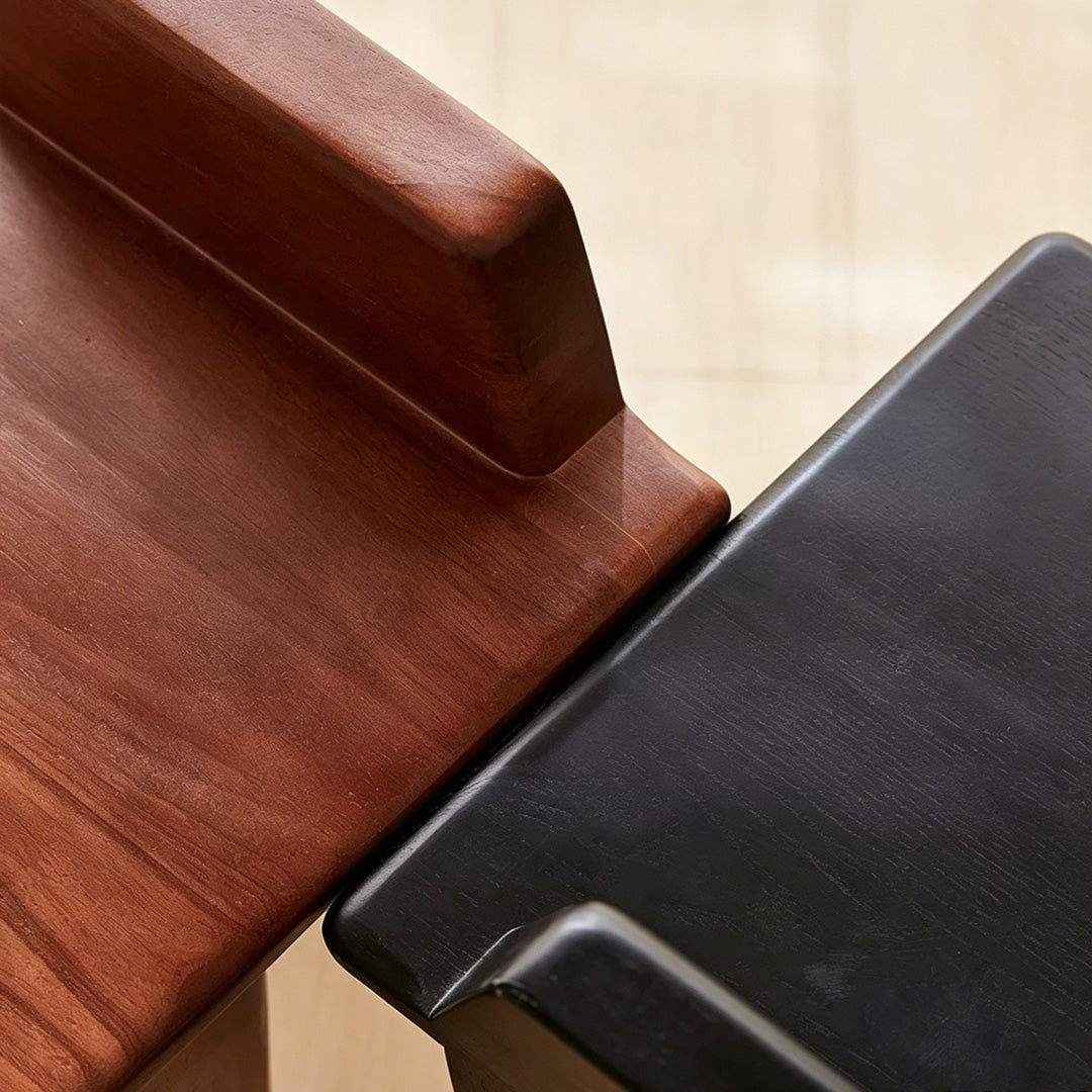 Briar dining chair curved backrest detail in walnut tone and black