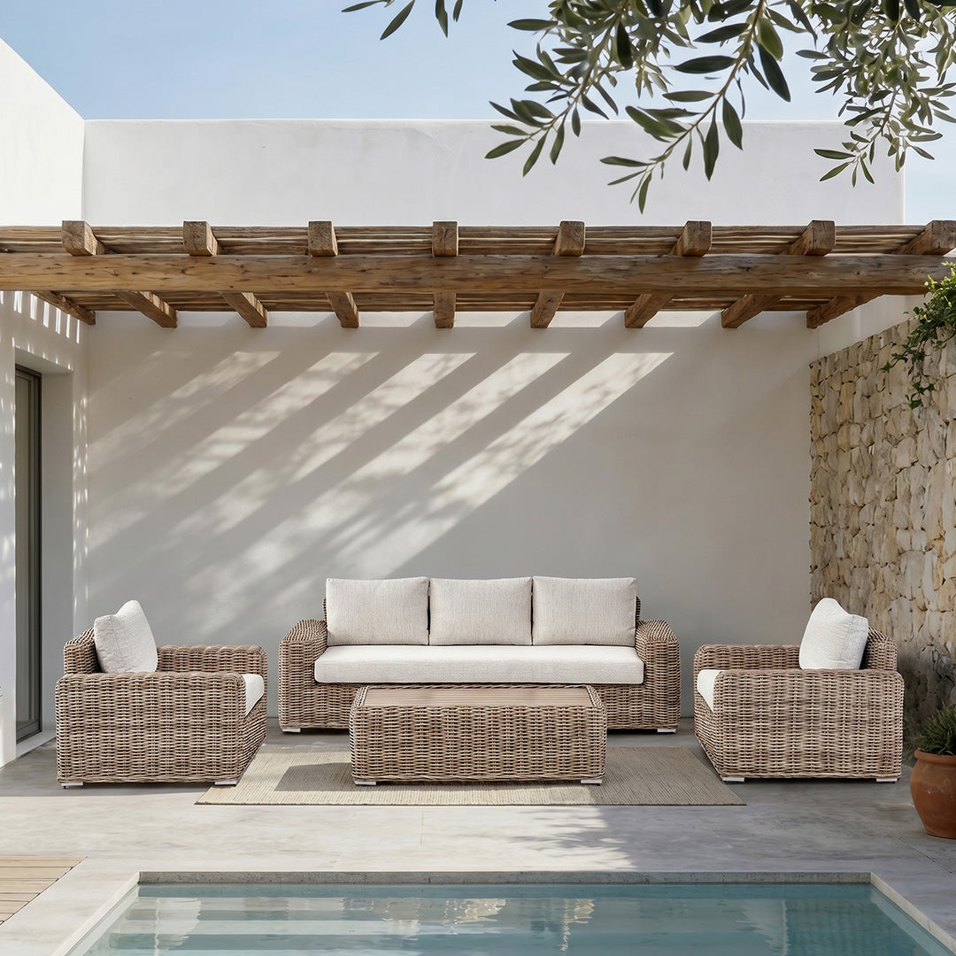 Owen beige wicker outdoor sofa set beside a swimming pool