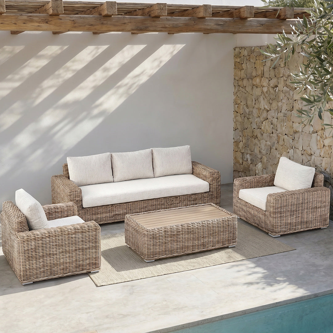 Owen beige wicker sofa, armchairs and coffee table angled view
