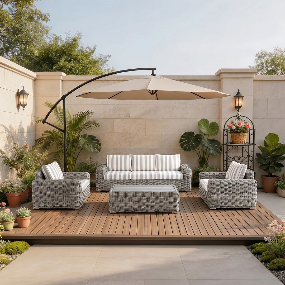 Owen wicker outdoor sofa set with striped cushions on a deck